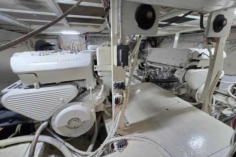 Slide: The Image of Engine room of a 1975 Hatteras 46 Convertible with Yanmar diesel engines. - 40