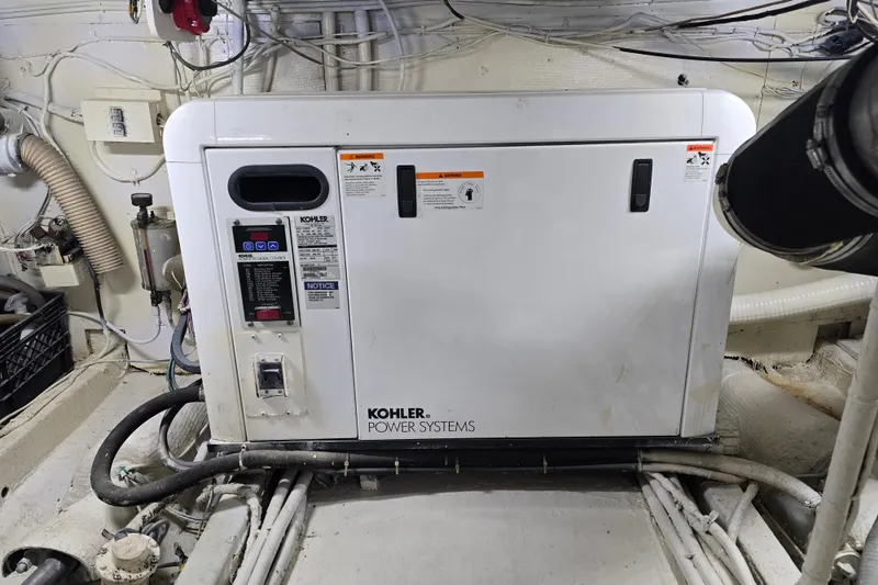 Slide: The Image of Kohler power system in 1975 Hatteras 46 Convertible engine room. - 41