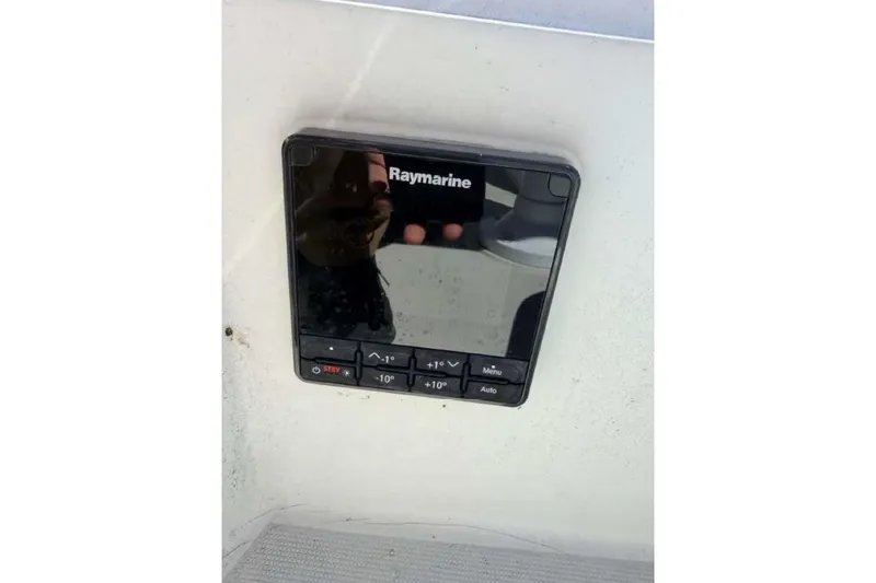 Slide: The Image of Raymarine control panel on 1988 O'Day 302 sailboat dashboard. - 15