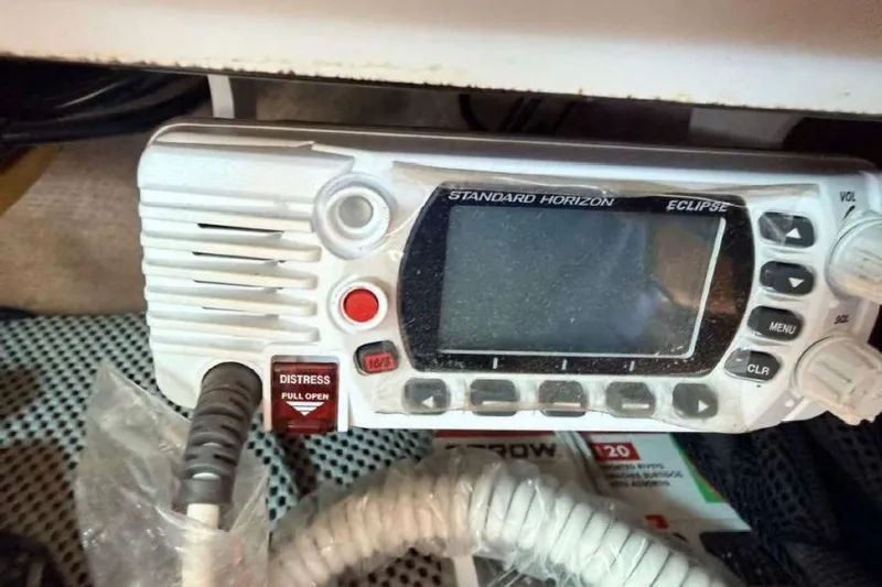 Slide: The Image of Standard Horizon Eclipse marine radio with distress button, onboard a 1988 O'Day 302 sailboat. - 22