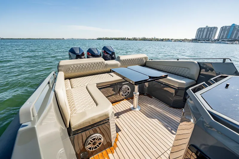 Slide: The Image of Luxury Skipper-BSK 38NC boat interior with seating and table, 2023 model on open water. - 102