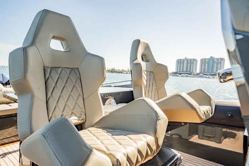 Slide: The Image of Luxurious seating on 2023 Skipper-BSK 38NC boat with waterfront view. - 111