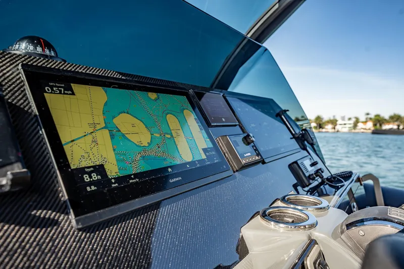 Slide: The Image of Dashboard of 2023 Skipper-BSK 38NC boat with navigation display and controls. - 114