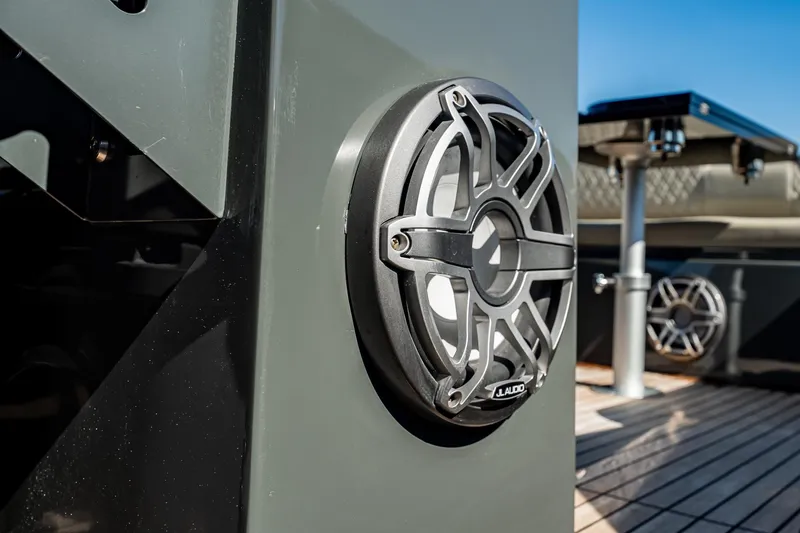 Slide: The Image of Close-up of JL Audio speaker on 2023 Skipper-BSK 38NC boat deck. - 115
