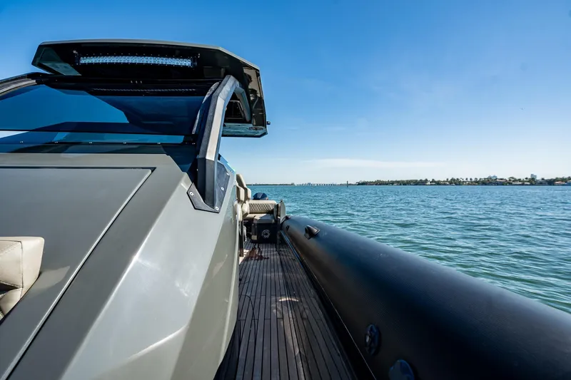 Slide: The Image of 2023 Skipper-BSK 38NC luxury boat cruising on a sunny day. - 116
