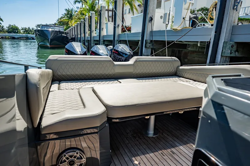 Slide: The Image of Luxurious seating on 2023 Skipper-BSK 38NC boat docked by waterfront. - 122