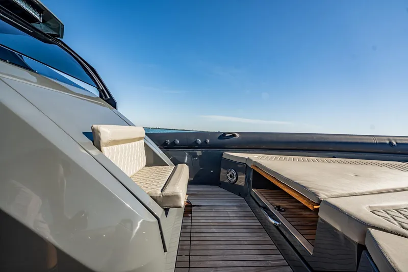 Slide: The Image of Luxurious seating on 2023 Skipper-BSK 38NC boat under clear blue sky. - 73
