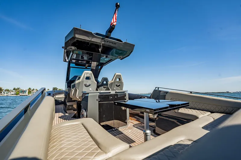 Slide: The Image of Luxury Skipper-BSK 38NC boat interior, 2023 model, featuring elegant seating and sleek design. - 88