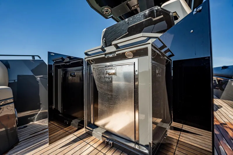 Slide: The Image of Luxury Skipper-BSK 38NC yacht kitchen area with stainless steel appliances, 2023 model. - 93