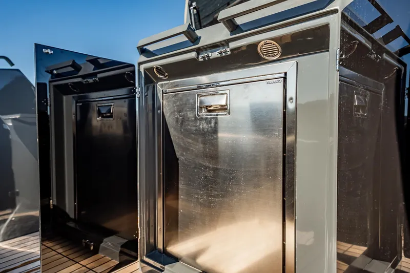 Slide: The Image of Stainless steel storage compartments on 2023 Skipper-BSK 38NC boat deck. - 94