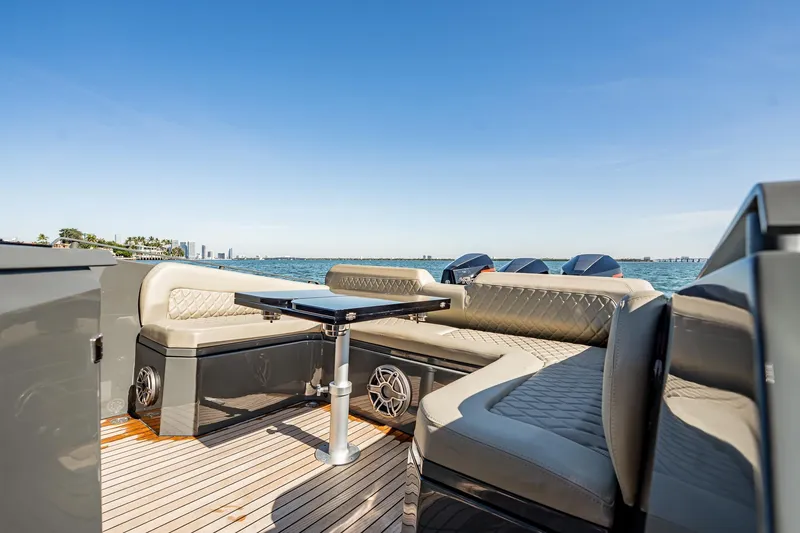 Slide: The Image of Luxurious 2023 Skipper-BSK 38NC yacht interior with plush seating and ocean view. - 99