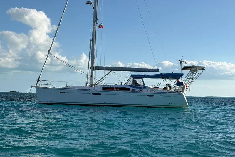 The Image of Sailing yacht Beneteau Oceanis 46, 2010 model, anchored in clear blue waters. - 0