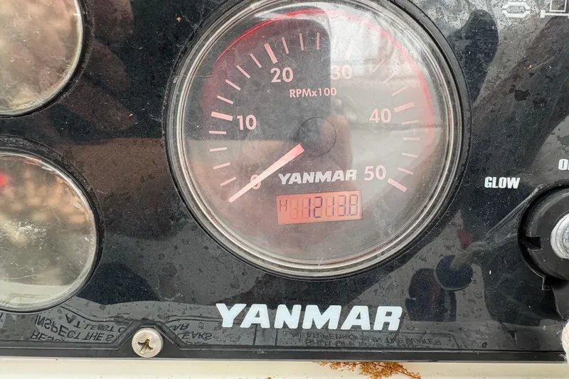 Slide: The Image of Yanmar engine tachometer on 2010 Beneteau Oceanis 46 sailboat, displaying 1421.8 hours. - 42