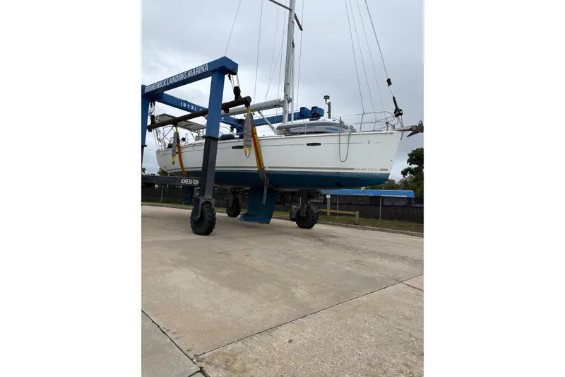 Slide: The Image of Beneteau Oceanis 46 sailboat from 2010 lifted at Brunswick Landing Marina. - 43