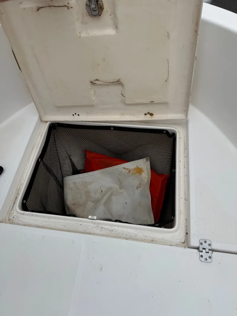 Slide: The Image of Storage compartment in Wellcraft 212 Fisherman boat, year 2005. - 6
