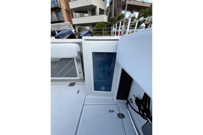Slide: The Image of 2019 Blackfin 272 CC boat interior with seating and storage compartments. - 37
