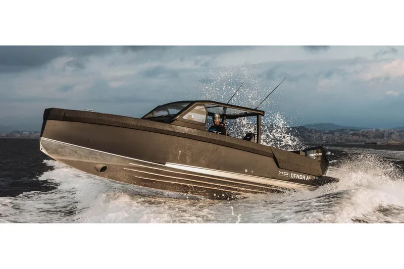 Slide: The Image of 2027 XO DFNDR A8 boat navigating rough waters with dynamic speed and agility. - 5