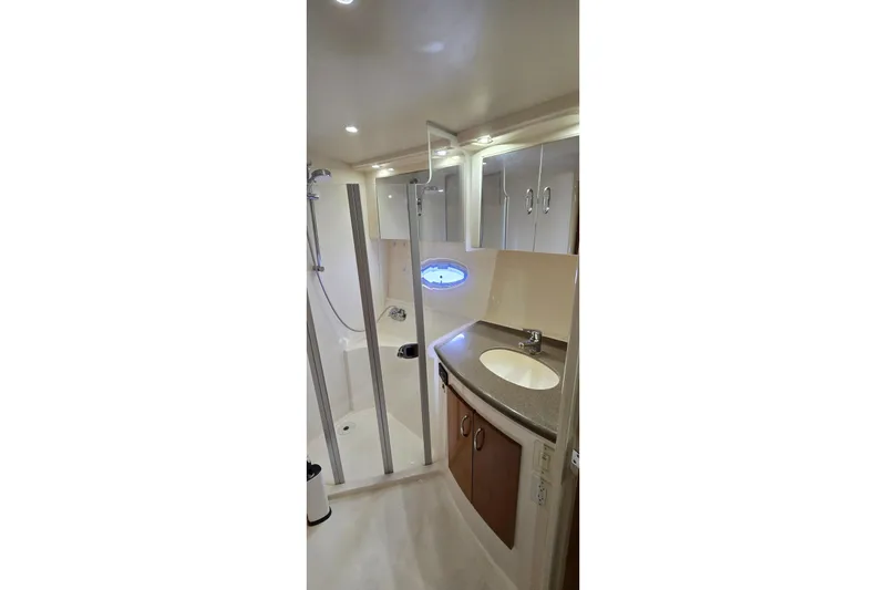 Slide: The Image of Bathroom interior of 2006 Carver 36 Mariner yacht, featuring sink and shower. - 41