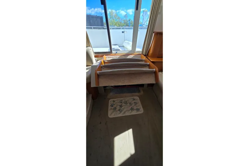 Slide: The Image of Interior view of 2006 Carver 36 Mariner yacht with stairs and sliding door. - 42