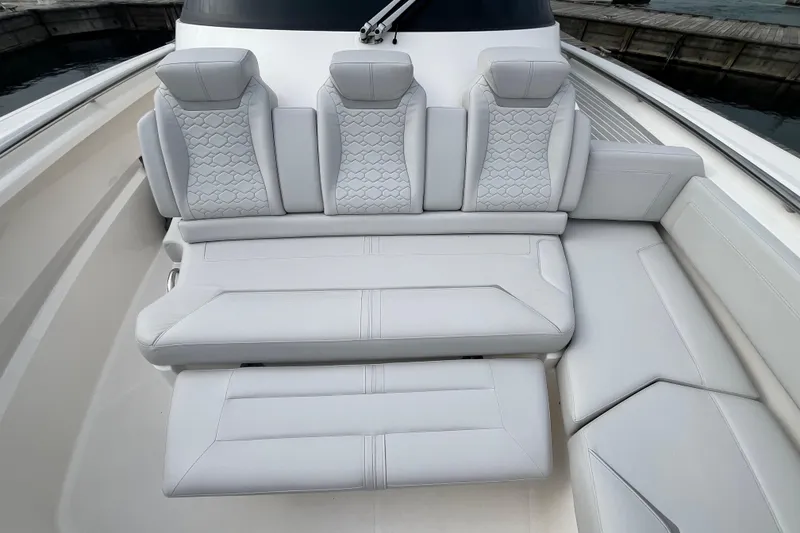 Slide: The Image of 2023 Tiara Yachts 43 LS luxury seating with elegant white upholstery. - 34