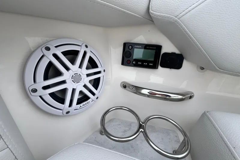 Slide: The Image of 2023 Tiara Yachts 43 LS interior with JL Audio speaker and Fusion MS-NRX300 control panel. - 36