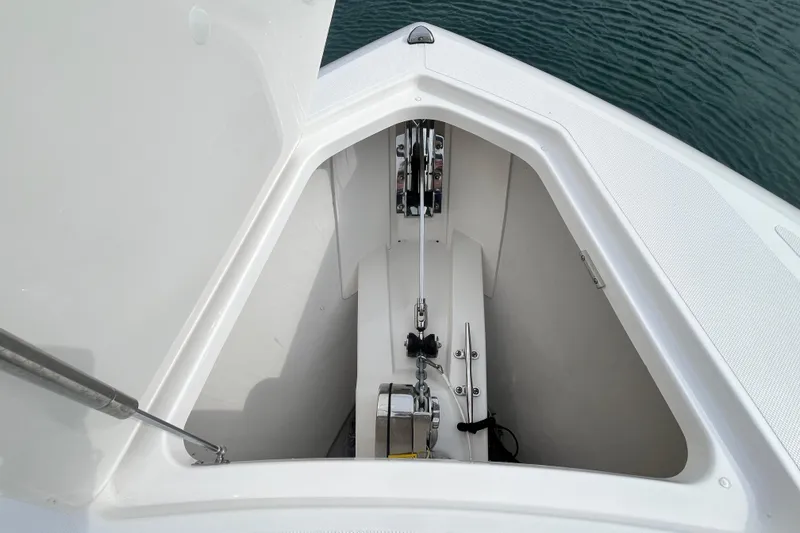 Slide: The Image of Anchor compartment of 2023 Tiara Yachts 43 LS, showcasing sleek design and functionality. - 37