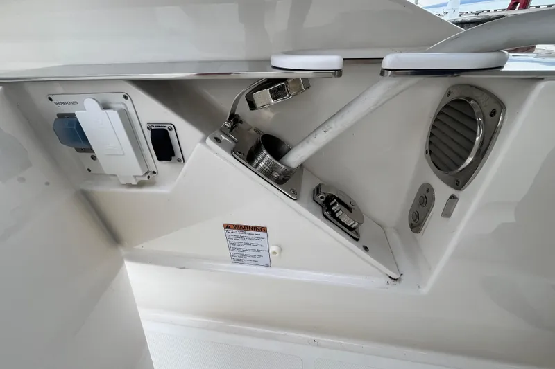 Slide: The Image of 2023 Tiara Yachts 43 LS yacht utility panel with power and ventilation features. - 40
