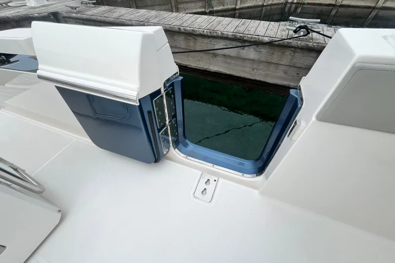 Slide: The Image of 2023 Tiara Yachts 43 LS swim platform with open access to water. - 7