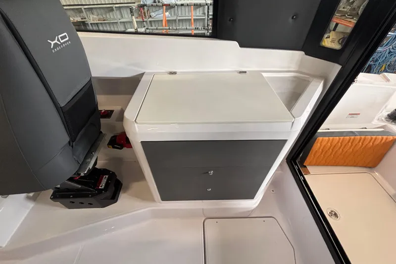 Slide: The Image of Interior of 2026 XO EXPLR 9 boat featuring seating and storage compartments. - 27