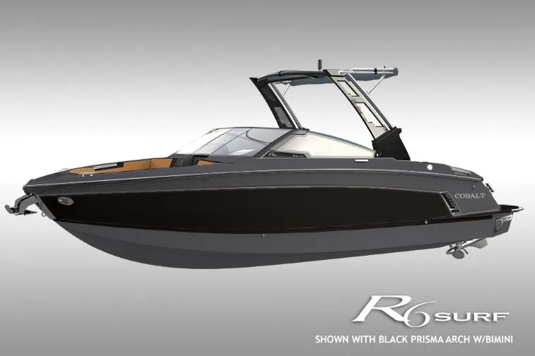 The Image of Cobalt R6 Surf 2026 boat with black Prisma arch and Bimini. - 1