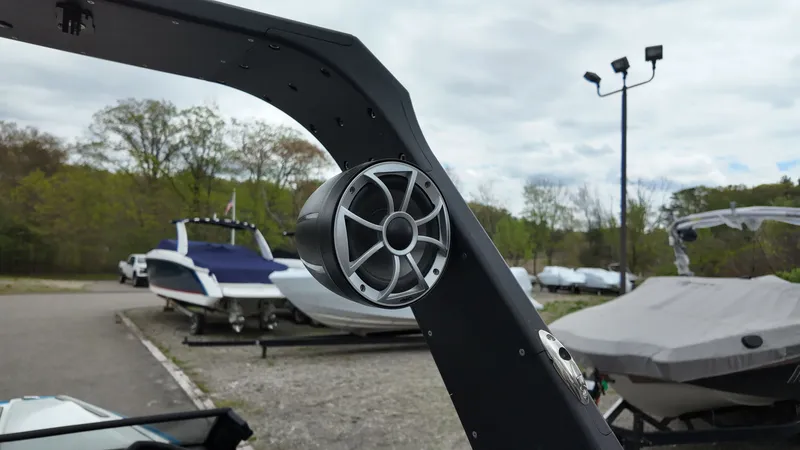 Slide: The Image of Speaker on a 2025 Flightcraft boat outdoors. - 19