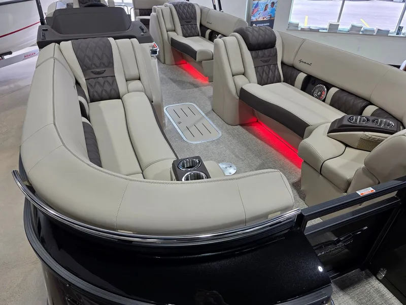 Slide: The Image of Interior of 2026 Bennington 25QFB ESP TRI PB with luxurious seating. - 10