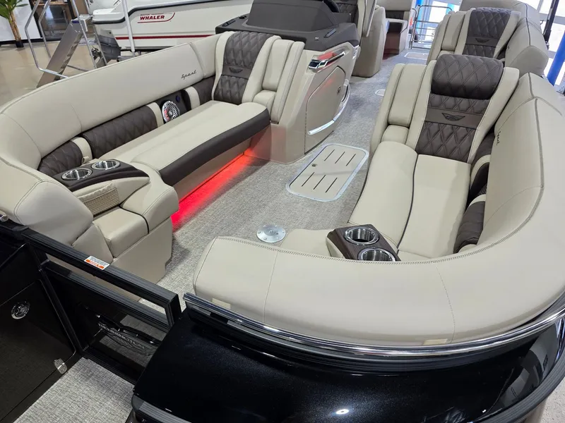 Slide: The Image of Luxurious interior of the 2026 Bennington 25QFB ESP TRI PB pontoon boat. - 11