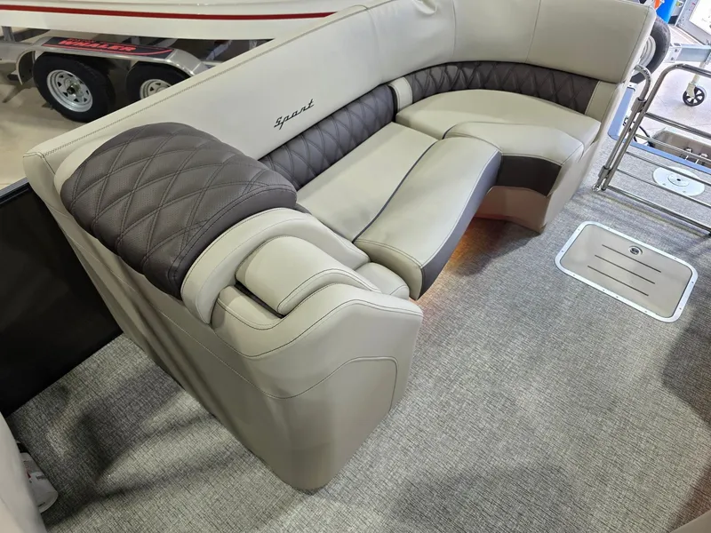 Slide: The Image of Luxurious seating in the 2026 Bennington 25QFB ESP TRI PB boat. - 15