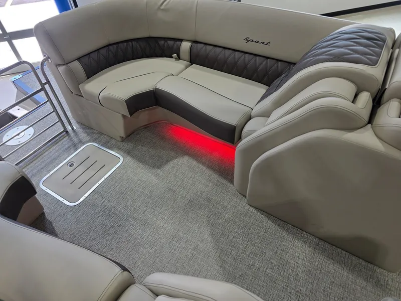 Slide: The Image of Luxurious interior of the 2026 Bennington 25QFB ESP TRI PB. - 16