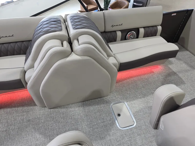 Slide: The Image of Interior of 2026 Bennington 25QFB ESP TRI PB with luxurious seating. - 17