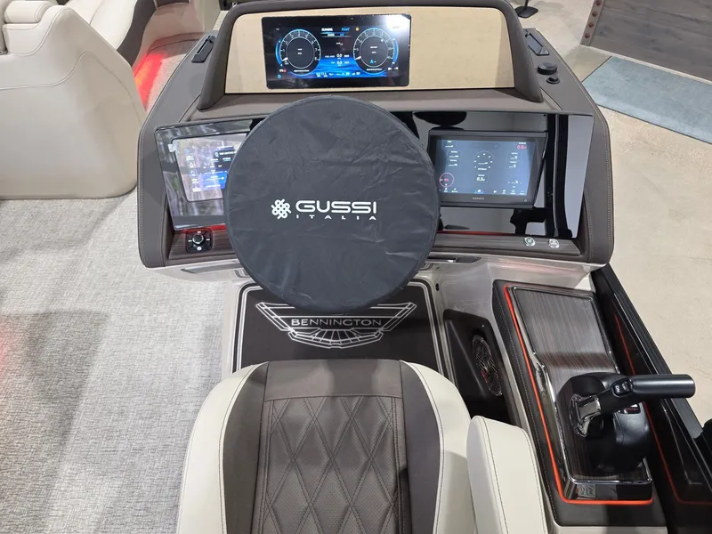Slide: The Image of Interior view of Bennington 25QFB ESP TRI PB 2026 helm console. - 19