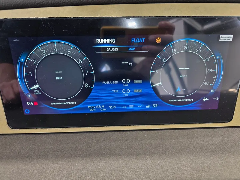 Slide: The Image of Bennington 25QFB ESP TRI PB 2026 dashboard with speedometer and RPM gauge. - 24