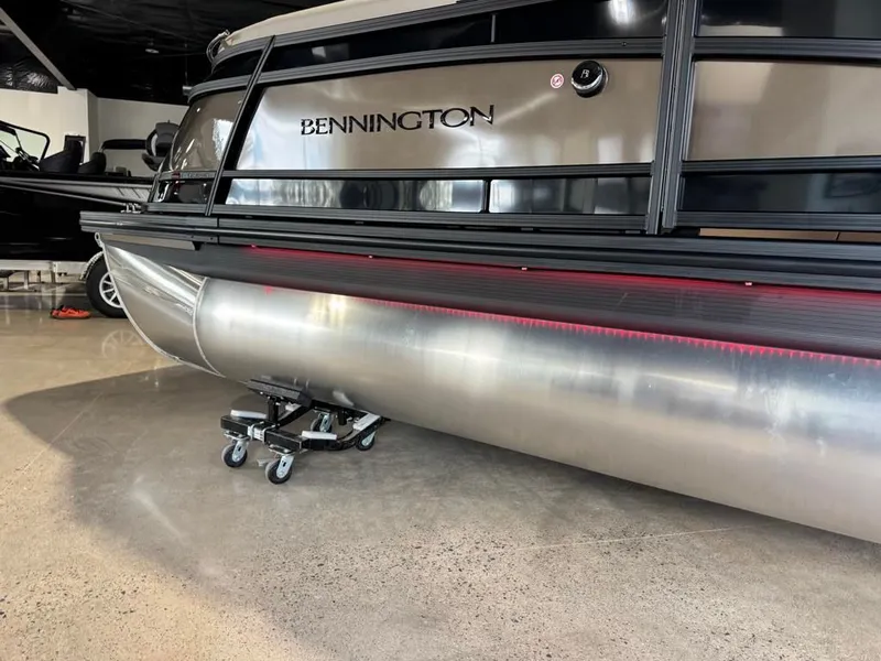 Slide: The Image of 2026 Bennington 25QFB ESP TRI PB pontoon boat in showroom. - 5