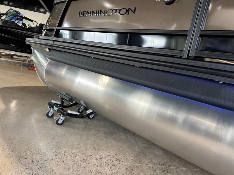 Slide: The Image of 2026 Bennington 25QFB ESP TRI PB pontoon boat in showroom. - 6