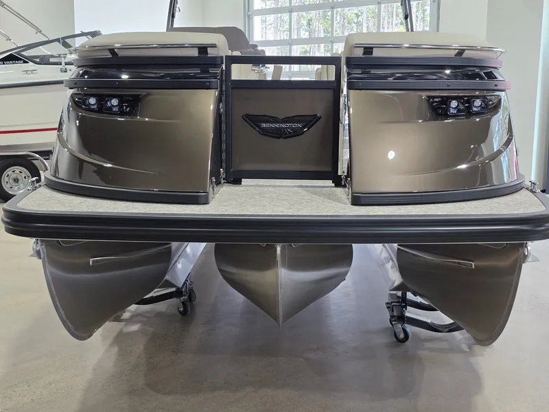 Slide: The Image of 2026 Bennington 25QFB ESP TRI PB pontoon boat, rear view in showroom. - 7