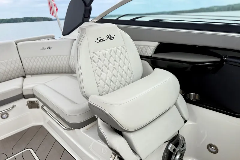 Slide: The Image of Luxurious interior of 2023 Sea Ray SLX 260 boat with elegant seating and stylish design. - 17