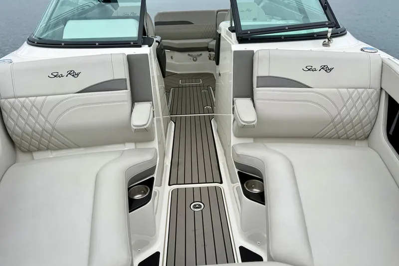 Slide: The Image of 2023 Sea Ray SLX 260 boat interior with luxurious seating and elegant design. - 22