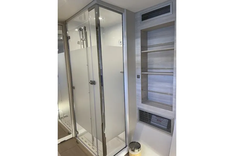 Slide: The Image of Modern shower and shelving in 2021 Catana 53 yacht bathroom. - 23