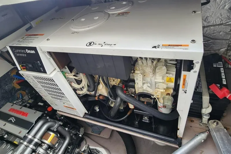 Slide: The Image of Cummins Onan generator in a 2021 Catana 53 yacht engine room. - 34