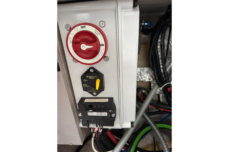 Slide: The Image of Electrical panel with switches and wiring on a 2021 Catana 53 yacht. - 74