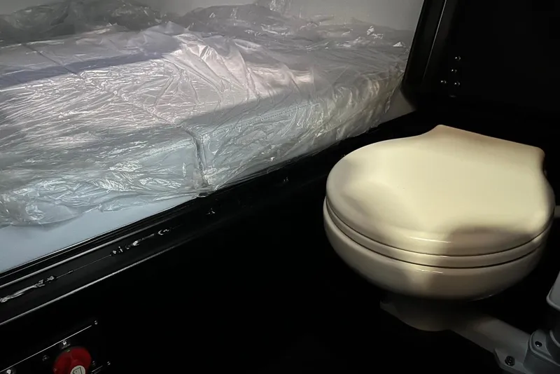 Slide: The Image of Interior of 2026 XO DFNDR A8 with bed and compact toilet. - 20