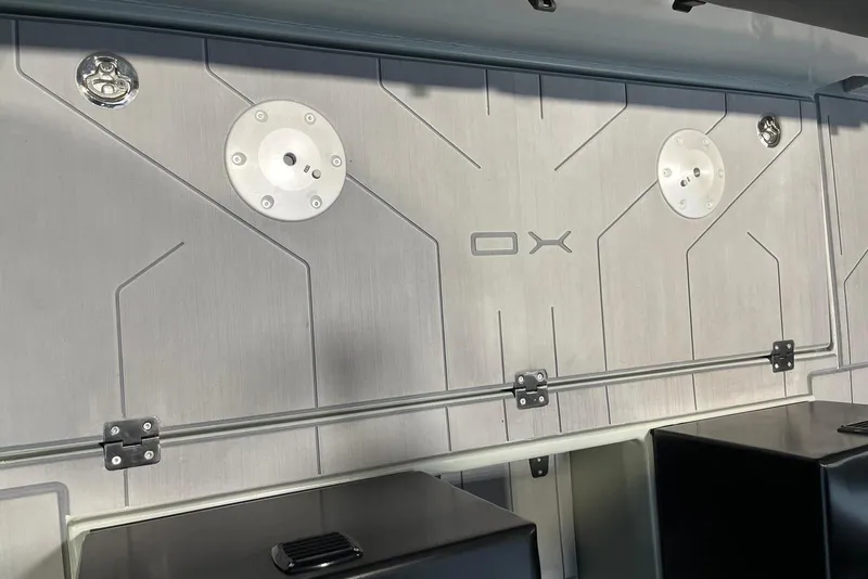 Slide: The Image of Interior panel of 2026 XO DFNDR A8 with sleek design and fixtures. - 34