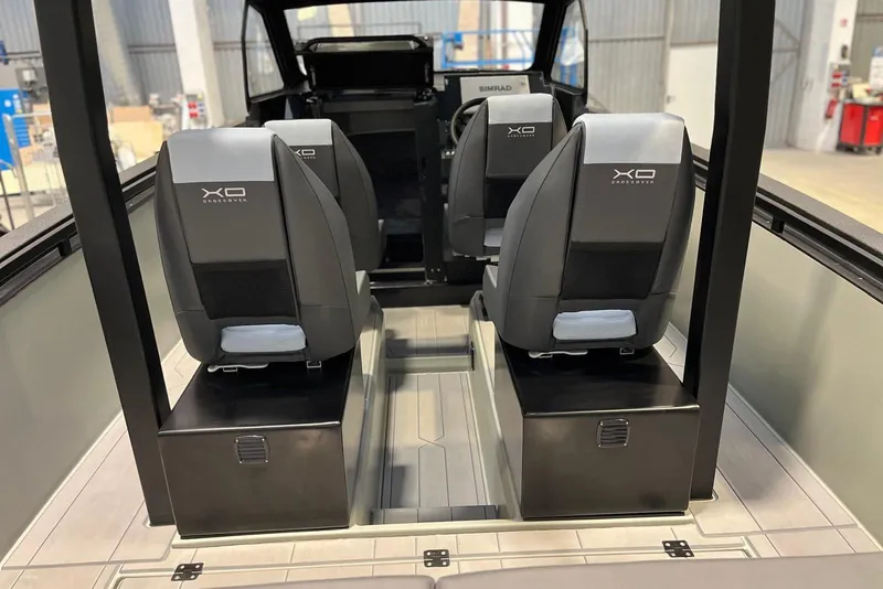 Slide: The Image of Interior of 2026 XO DFNDR A8 boat with modern seating and sleek design. - 37