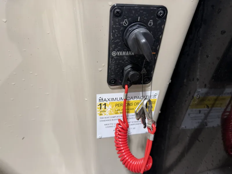 Slide: The Image of Yamaha ignition key with red safety cord on a G3 SELECT 20 C boat. - 16